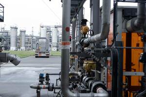 Photo: Industrial plant with pipes and fraction towers